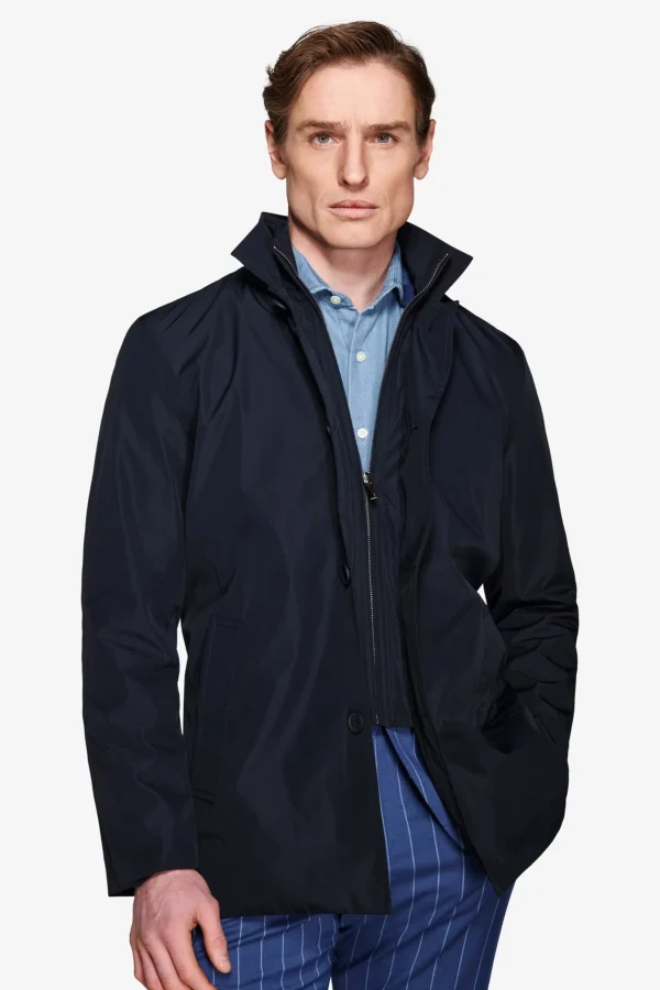 Trench con pettorina blu